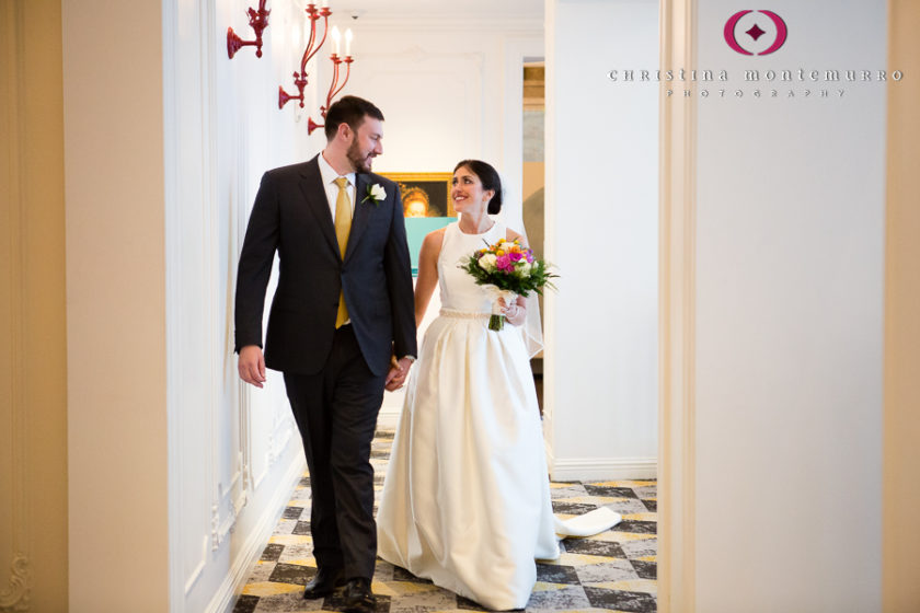 Kimpton Hotel Monaco Pittsburgh Wedding Photos Bride and Groom walking through quirky hotel