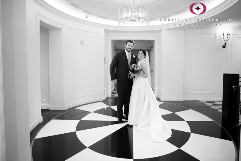 Kimpton Hotel Monaco Pittsburgh Wedding Photos Bride and Groom Portrait in lobby with black and white geometric floor