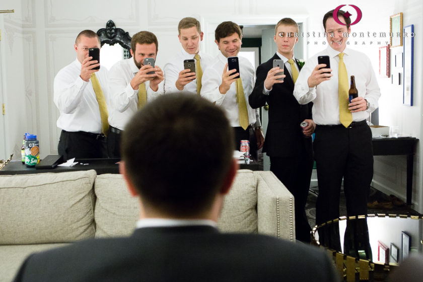 Kimpton Hotel Monaco Pittsburgh Wedding Photos Groom and Groomsmen with Camera Phones