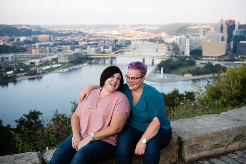 Engaged Women Sitting on Mount Washington with Iconic Pittsburgh View