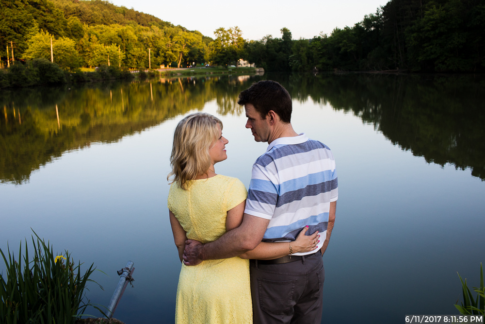 Bride to Be in Yellow Dress with Fiance Standing by Marshall Lake in North Park Pittsburgh