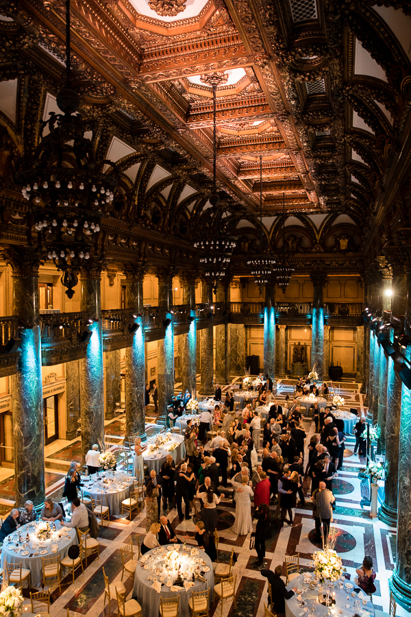 Winter Wedding at the Elegant Carnegie Music Hall Foyer with Blue Uplighting