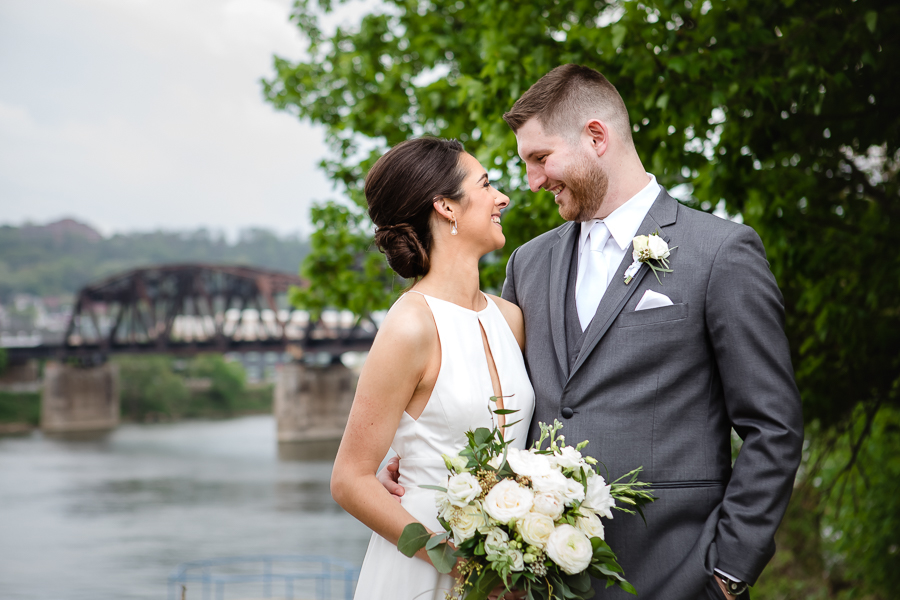 Classic Bride and Groom Wedding Portrait at Washington's Landing with Railroad Bridge