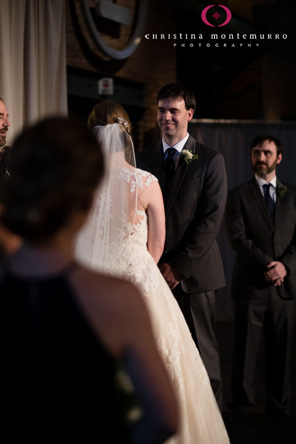 Bride and Groom at Wedding Ceremony in Great Hall with Cream Linen Backdrop Drape