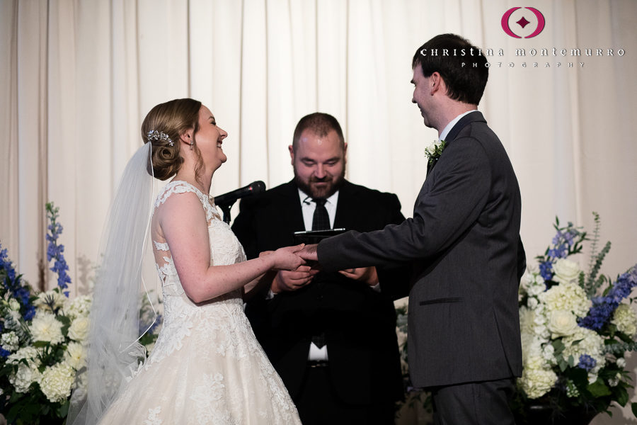 Bride and Groom at Wedding Ceremony in Great Hall with Cream Linen Backdrop Drape