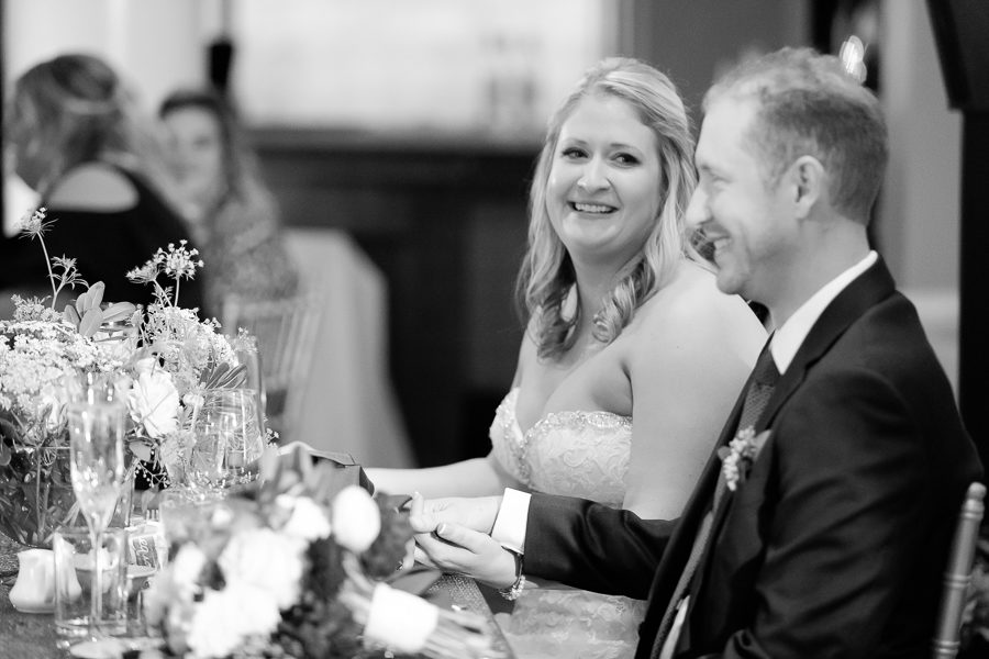 Bride and Groom Listening to Speeches