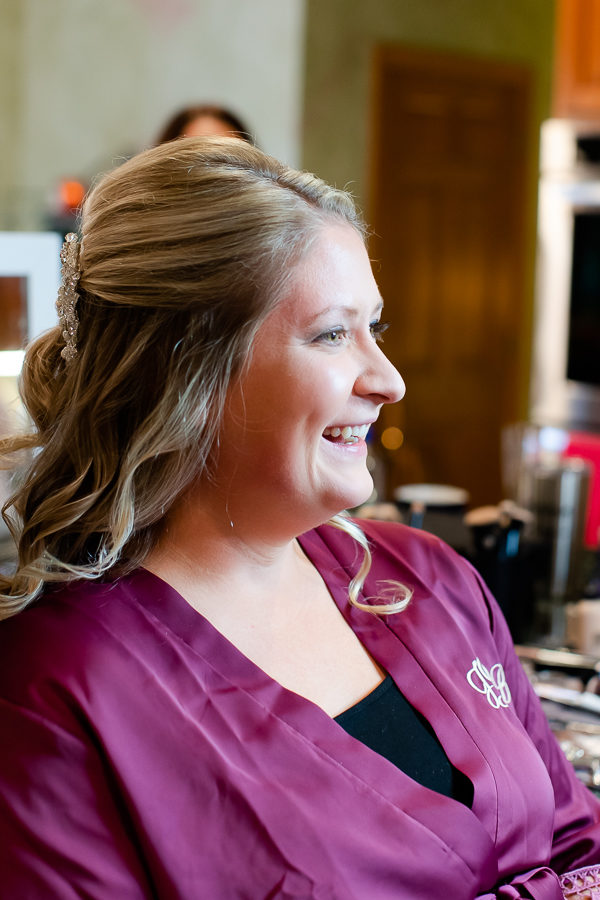 Bride Getting Makeup done by Caviar & Curls