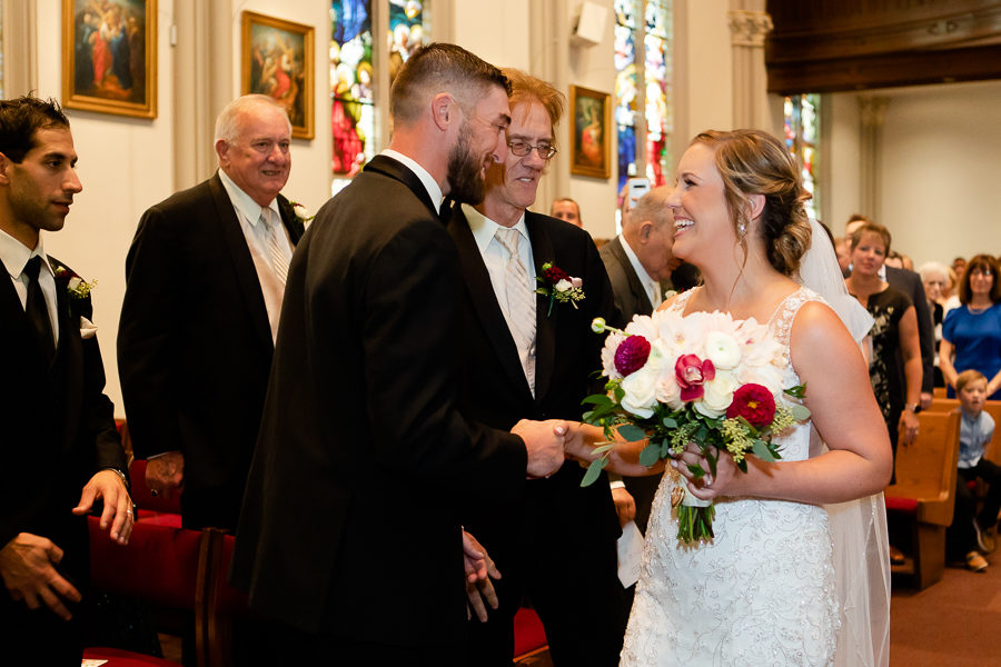 Happy Bride meets groom at their wedding ceremony