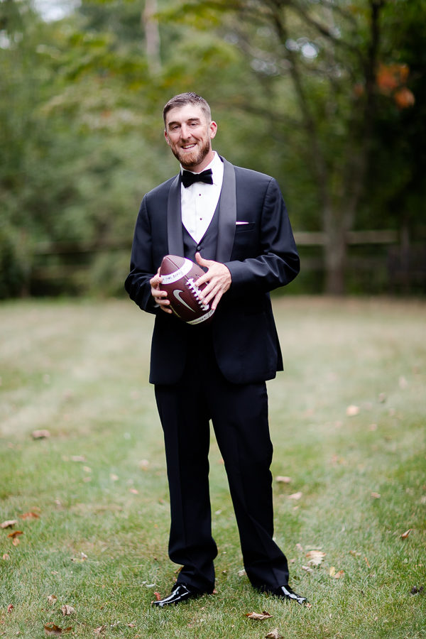 Groom with football