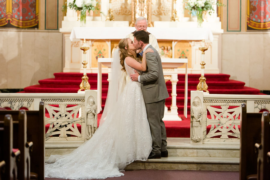 Lauren and Matt exchange rings at St. Augustine Church Pittsburgh