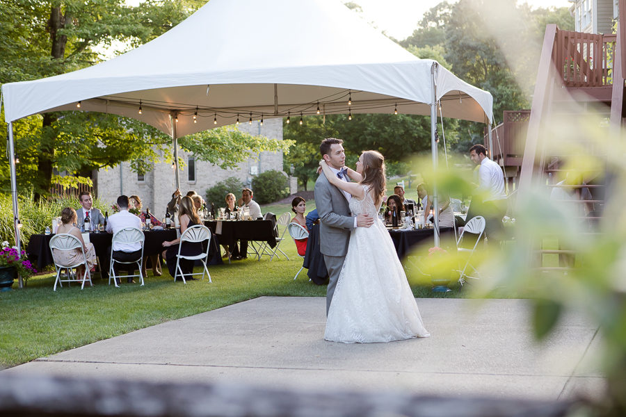 Bride and groom first dance at backyard wedding