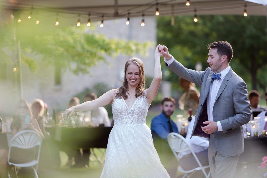 Bride and groom first dance at backyard wedding