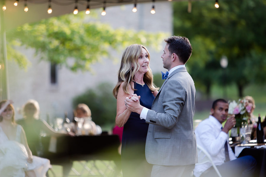 Mother son dance at backyard wedding